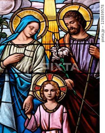 Holy Family, stained glass window in the Parish Church of the Visitation of the Virgin Mary in Zagreb, Croatia 128839578