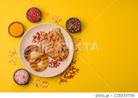 Chicken breast, grilled fillet, meat meal on a plate 128839756