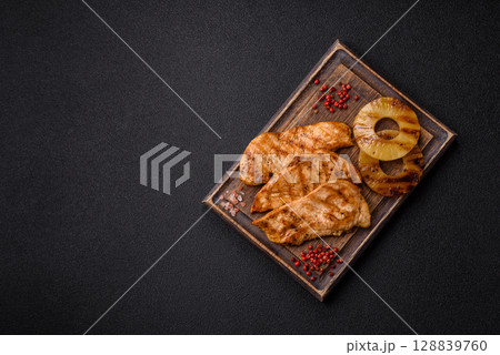 Chicken breast, grilled fillet, meat meal on a plate 128839760