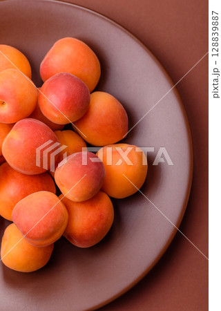 Fresh ripe fruit apricots are red yellow in color Fresh ripe fruit apricots are red yellow in color 128839887