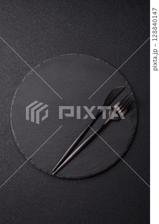 Empty plate with utensils as a conceptual background for lunch, breakfast, meal 128840147