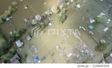 Floods and cyclone, global warming. Climate change,natural disasters the tsunami of nature.The apocalypse, catastrophes.Storms and destruction.The remnants of human life are floating in dirty water 128840304