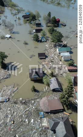 Floods and cyclone, global warming. Climate change,natural disasters the tsunami of nature.The apocalypse, catastrophes.Storms and destruction.The remnants of human life are floating in dirty water 128840309