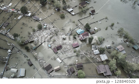 Floods and cyclone, global warming. Climate change,natural disasters the tsunami of nature.The apocalypse, catastrophes.Storms and destruction.The remnants of human life are floating in dirty water 128840320