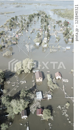 Floods and cyclone, global warming. Climate change,natural disasters the tsunami of nature.The apocalypse, catastrophes.Storms and destruction.The remnants of human life are floating in dirty water Floods and cyclone, global warming. Climate change,natural disasters the tsunami of nature.The apocalypse, catastrophes.Storms and destruction.The remnants of human life are floating in dirty water 128840321