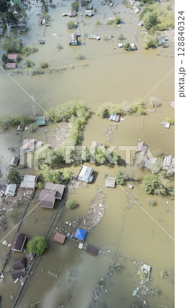 Floods and cyclone, global warming. Climate change,natural disasters the tsunami of nature.The apocalypse, catastrophes.Storms and destruction.The remnants of human life are floating in dirty water 128840324