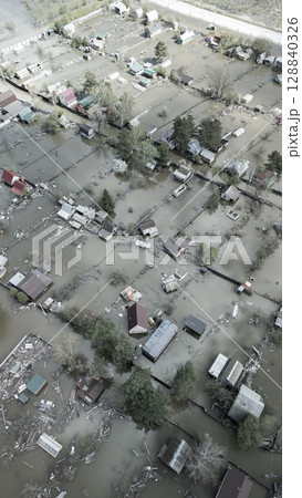 Floods and cyclone, global warming. Climate change,natural disasters the tsunami of nature.The apocalypse, catastrophes.Storms and destruction.The remnants of human life are floating in dirty water 128840326