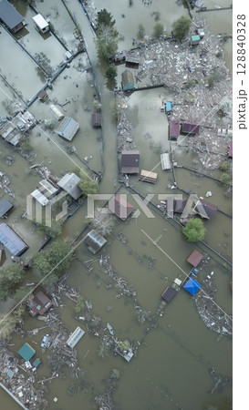 Floods and cyclone, global warming. Climate change,natural disasters the tsunami of nature.The apocalypse, catastrophes.Storms and destruction.The remnants of human life are floating in dirty water Floods and cyclone, global warming. Climate change,natural disasters the tsunami of nature.The apocalypse, catastrophes.Storms and destruction.The remnants of human life are floating in dirty water 128840328