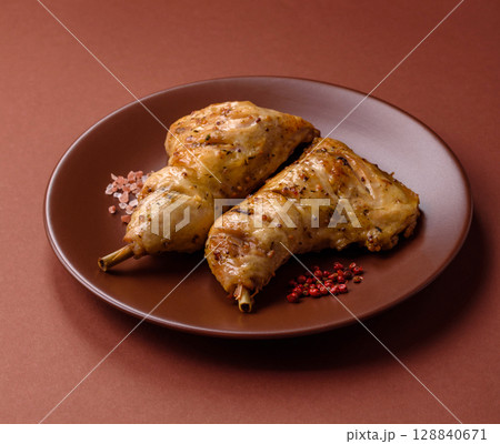 Grilled chicken leg or quarter. Barbecued meat with salt and spices Grilled chicken leg or quarter. Barbecued meat with salt and spices 128840671