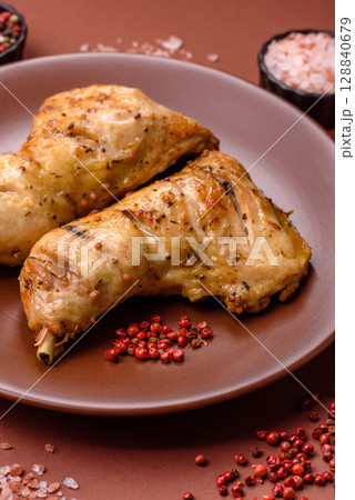Grilled chicken leg or quarter. Barbecued meat with salt and spices 128840679