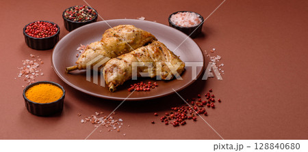 Grilled chicken leg or quarter. Barbecued meat with salt and spices 128840680
