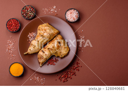 Grilled chicken leg or quarter. Barbecued meat with salt and spices 128840681