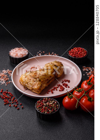 Grilled chicken leg or quarter. Barbecued meat with salt and spices 128840705