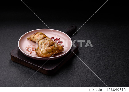 Grilled chicken leg or quarter. Barbecued meat with salt and spices Grilled chicken leg or quarter. Barbecued meat with salt and spices 128840713