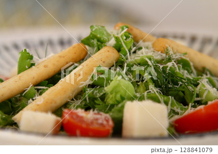 Mediterranean salad with feta cheese, tomatoes and peppers. Mediterranean salad Mediterranean salad with feta cheese, tomatoes and peppers. Mediterranean salad 128841079