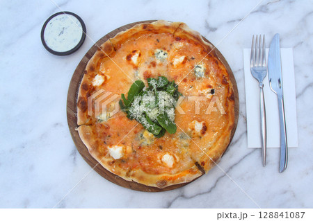 Brazilian pizza with sun-dried tomatoes, arugula and mozzarella. Traditional Brazilian Pizza 128841087