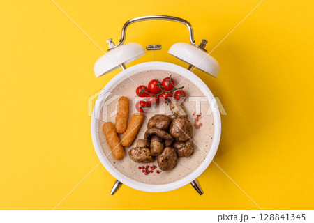 Cheese sticks, mozzarella fried, fast food breaded with sauce. Concept of time to eat fast food Cheese sticks, mozzarella fried, fast food breaded with sauce. Concept of time to eat fast food 128841345