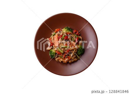 Chinese or Thai food, rice noodles with meat, salt and spices. Asian food Chinese or Thai food, rice noodles with meat, salt and spices. Asian food 128841846