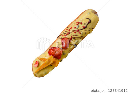 French food, dessert eclair with chocolate filling. Eclair as a background 128841912