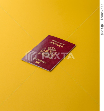 Spain passport for travelling, flying and doing business. Spanish document, id 128842347