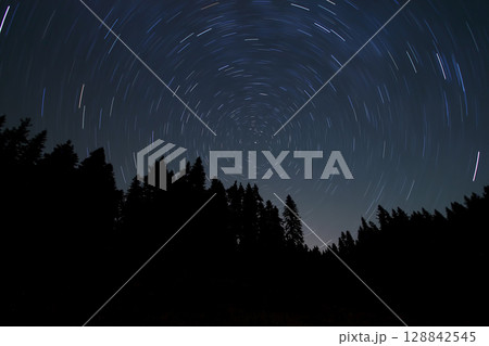 A view of the stars of the Milky Way with a mountain top in the foreground.Perseid Meteor Shower observation A view of the stars of the Milky Way with a mountain top in the foreground.Perseid Meteor Shower observation 128842545