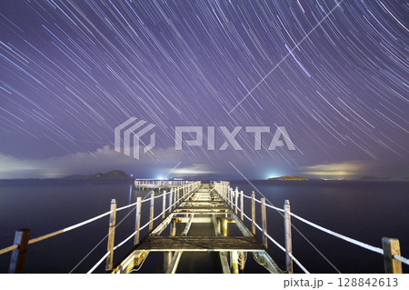 A view of the stars of the Milky Way with a mountain top in the foreground.Perseid Meteor Shower observation 128842613