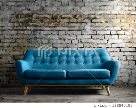 Blue sofa in a loft interior against a textured wall. Sofa in a home. Neural network AI generated art Blue sofa in a loft interior against a textured wall. Sofa in a home. Neural network AI generated art 128843199
