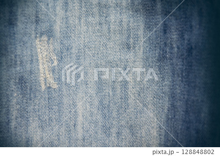 old blue jeans. denim jeans texture background 128848802