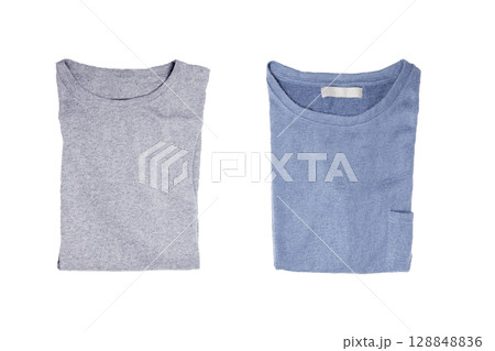 Folded t-shirt isolated on white background. Folded t-shirt isolated on white background. 128848836