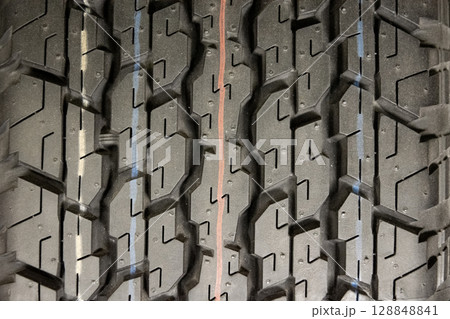 Car tire background, Tyre texture closeup background. Car tire background, Tyre texture closeup background. 128848841