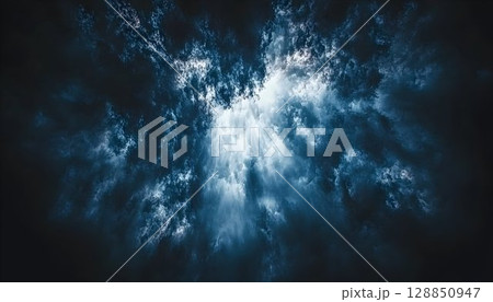 Ethereal Light Bursting Through Dark, Textured Clouds in a Drama 128850947