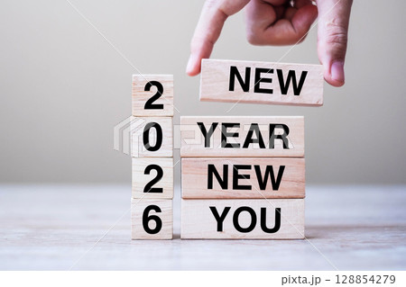 hand holding wooden block with text 2026 NEW YEAR NEW YOU on table background. Resolution, strategy, goal, business and holiday concepts hand holding wooden block with text 2026 NEW YEAR NEW YOU on table background. Resolution, strategy, goal, business and holiday concepts 128854279