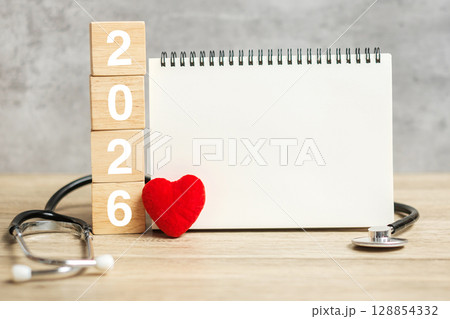 2026 Happy New Year for healthcare, Insurance, Wellness and medical concept. Stethoscope and blank notebook for copy space your text 128854332