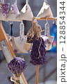 Handmade Lavender Decoration With Dried Herb Bundles and Fabric Pouches 128854344