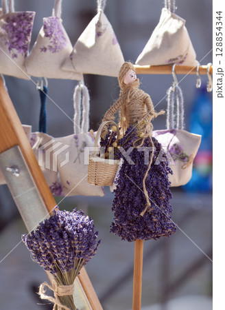 Handmade Lavender Decoration With Dried Herb Bundles and Fabric Pouches 128854344