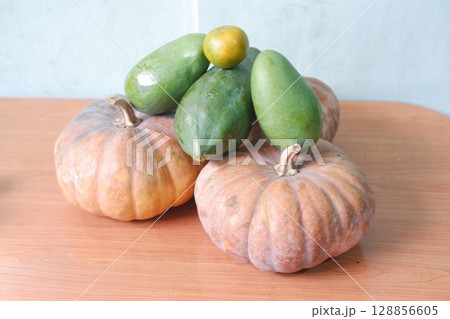 Mixed Tropical Fruits with Pumpkins and Papayas Mixed Tropical Fruits with Pumpkins and Papayas 128856605