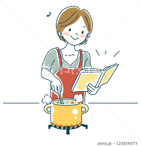 レシピを見ながら料理をする女性 128856873