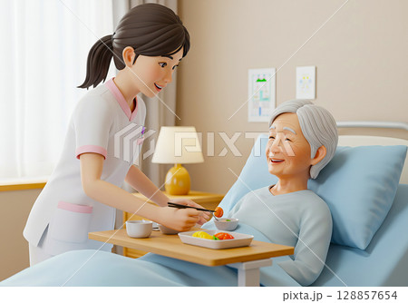 食事介助をする介護士と高齢者の女性 128857654