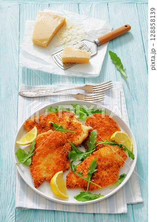 crispy parmesan crusted chicken cutlets, top view 128858139