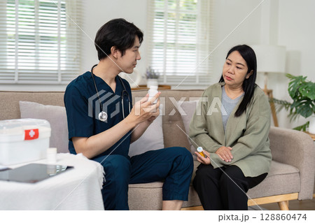 Healthcare Professional Consulting with Patient in Modern Medical Office Setting Healthcare Professional Consulting with Patient in Modern Medical Office Setting 128860474