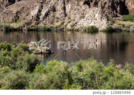 Paddleboarding on the Waters of the Colorado River in Arizona Paddleboarding on the Waters of the Colorado River in Arizona 128865498