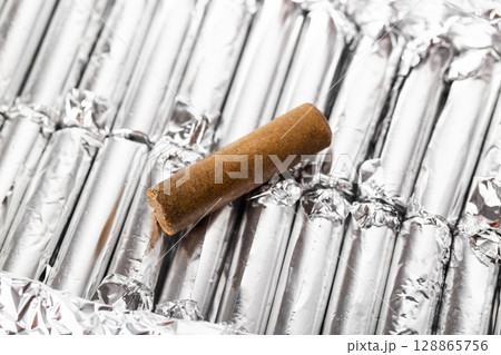 Rectal propolis suppository for eliminating edema and microbes in urology during the treatment of prostatitis, close-up 128865756