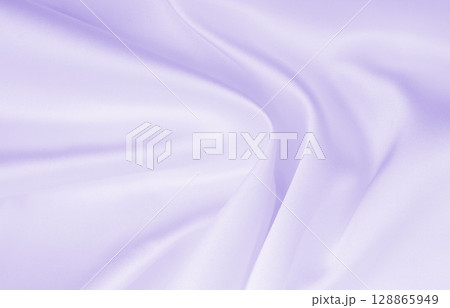 Smooth elegant lilac silk or satin texture as wedding background. Luxurious background design 128865949