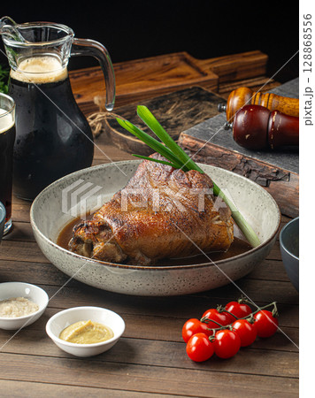 Pork knuckle with sauces cabbage and potatoes 128868556