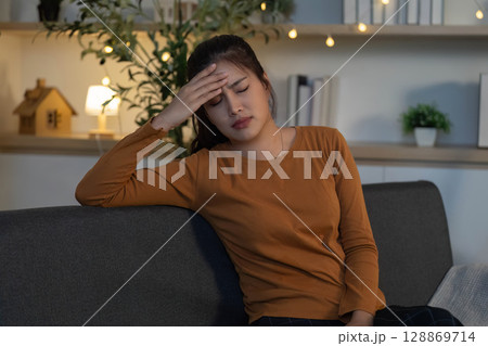 Mental Health. Young woman experiencing discomfort and stress at home. Mental Health. Young woman experiencing discomfort and stress at home. 128869714