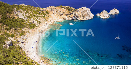 Sporades, Greece . landmarks of Skiathos Island. Kastro beach famous for his ancient ruined castle.  128871116