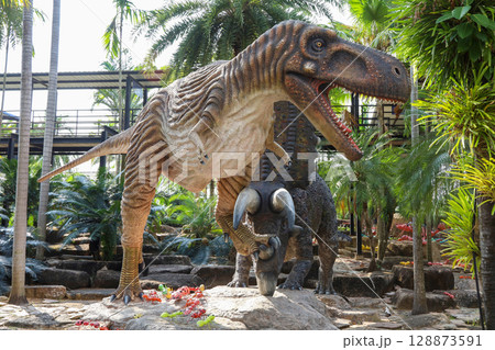 Pattaya,Thailand-January 28,2022:The dinosaurs statue is beautiful for travel in holiday at Nong Nooch Tropical Botanical Garden 128873591