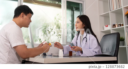Patient Interaction. Doctor advising patient on medication and health. 128873682