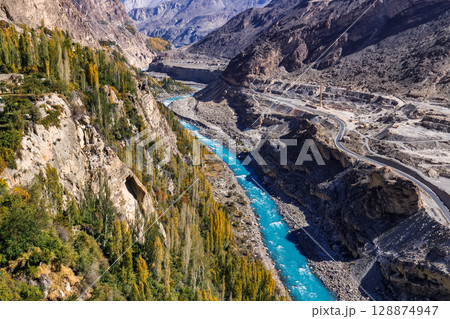 Autumn view blue water of Hunza River with mountain range in the background,Hunza, Pakistan. 128874947