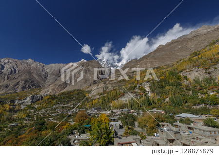 The landscape of Hunza Valley In Autumn Season, with mountain range in the background,Hunza, Pakistan. The landscape of Hunza Valley In Autumn Season, with mountain range in the background,Hunza, Pakistan. 128875879